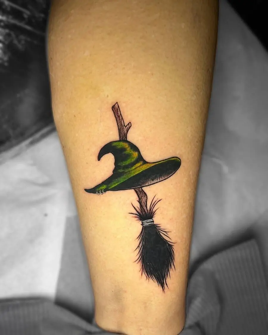 Stylish witch hat tattoo with a whimsical flair