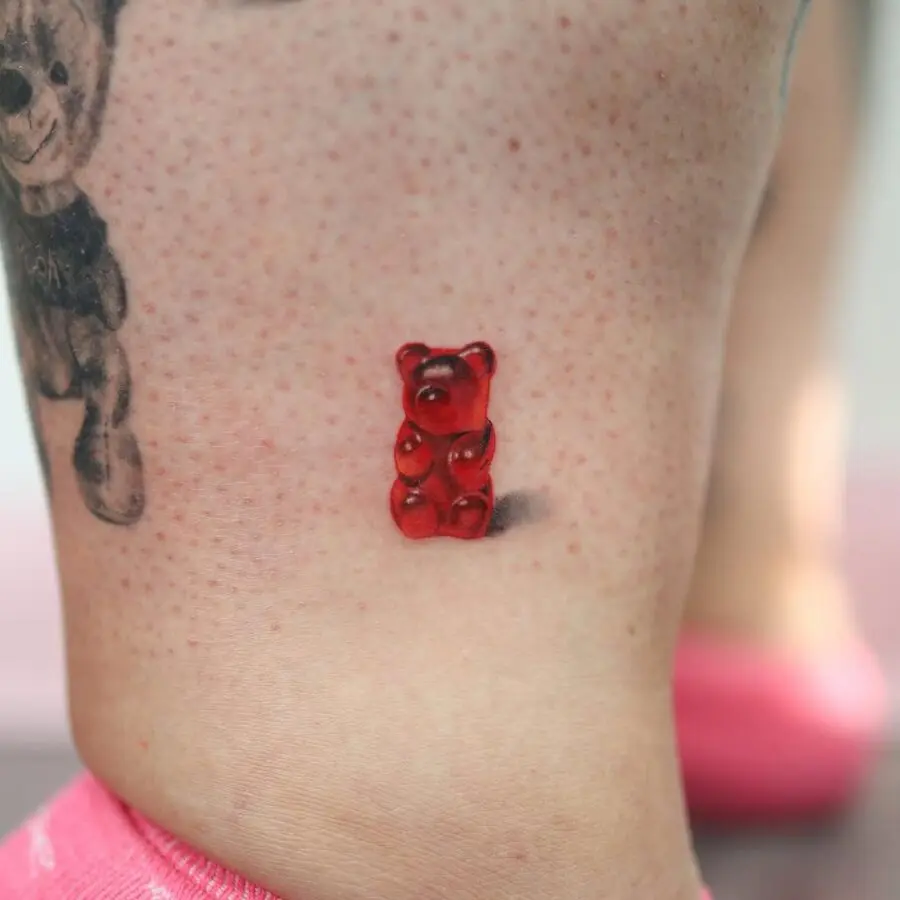 Vibrant gummy bear tattoo on skin