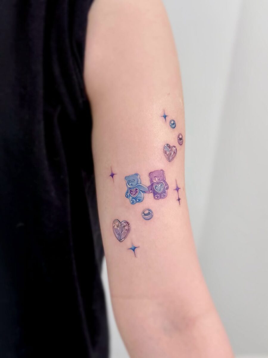 Vibrant gummy bear tattoo with playful elements