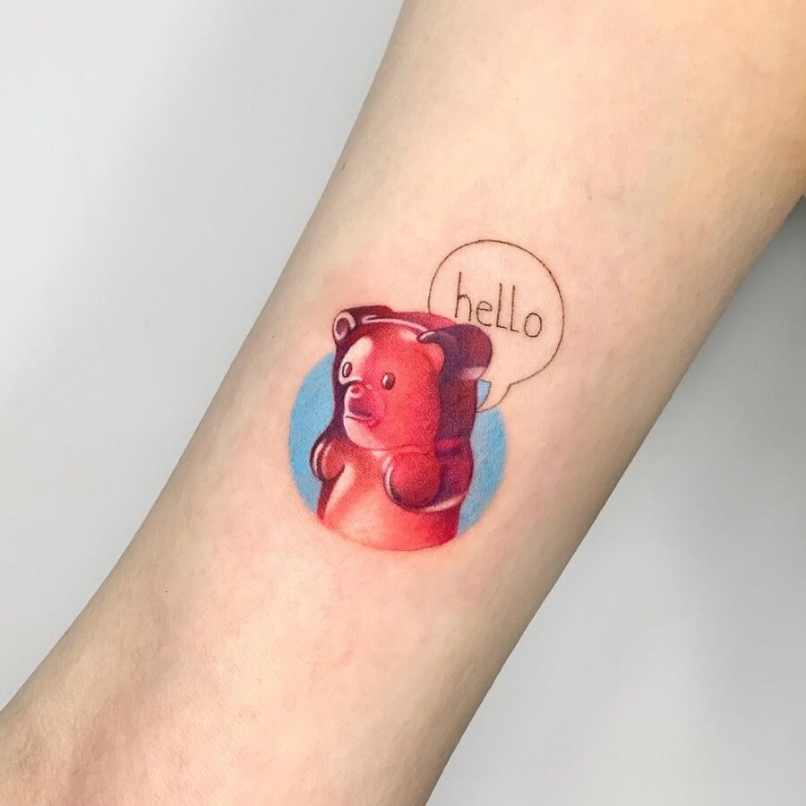 Whimsical gummy bear tattoo radiating charm
