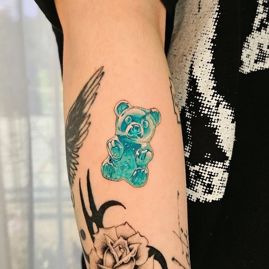 Colorful gummy bear tattoo with playful vibes