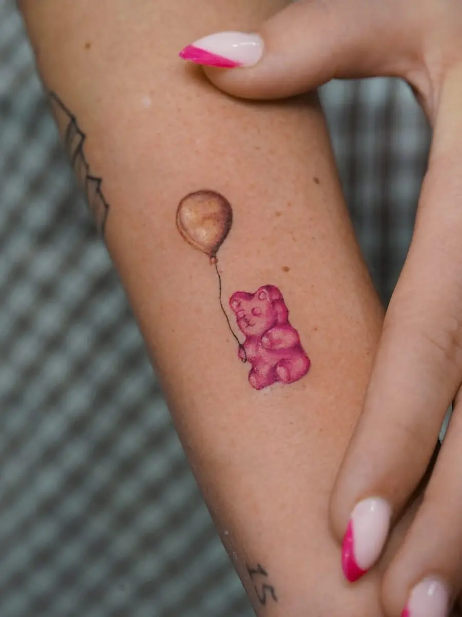 Charming Gummy Bear Tattoo Holding Balloon
