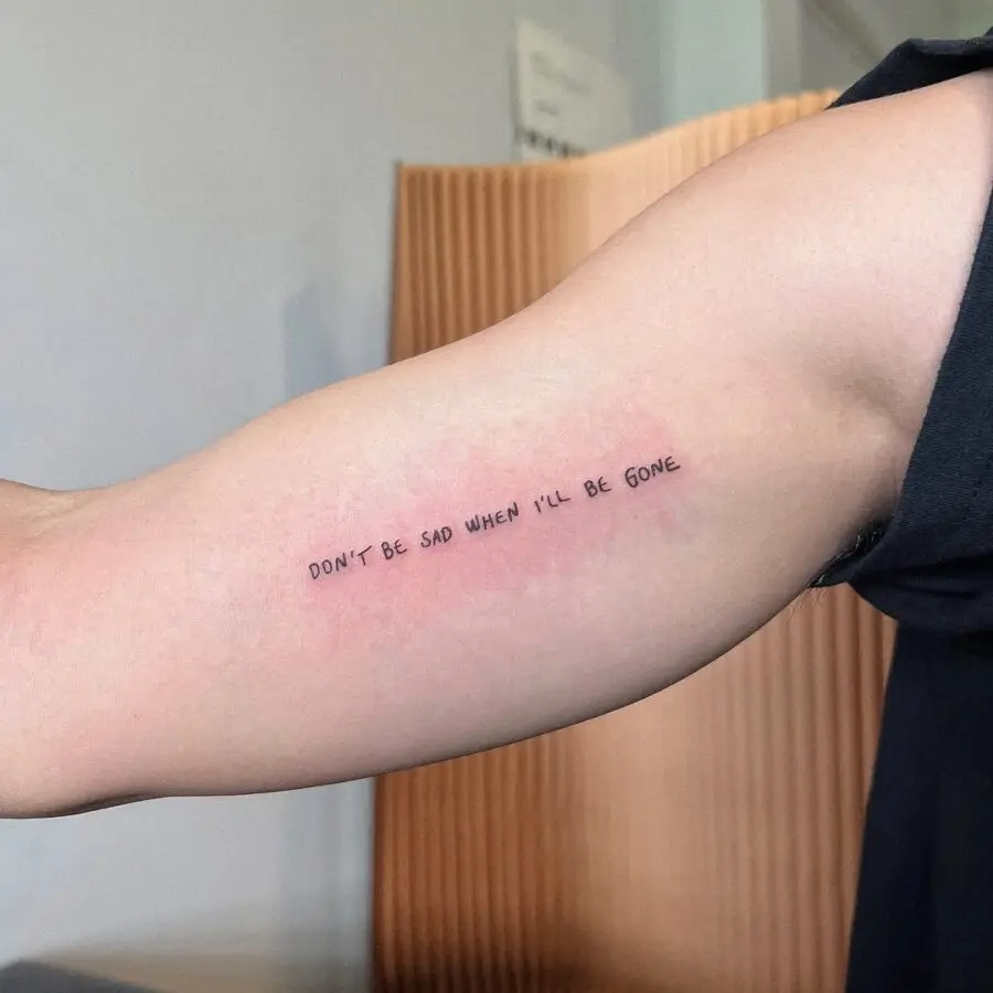 Meaningful quote tattoo on the arm