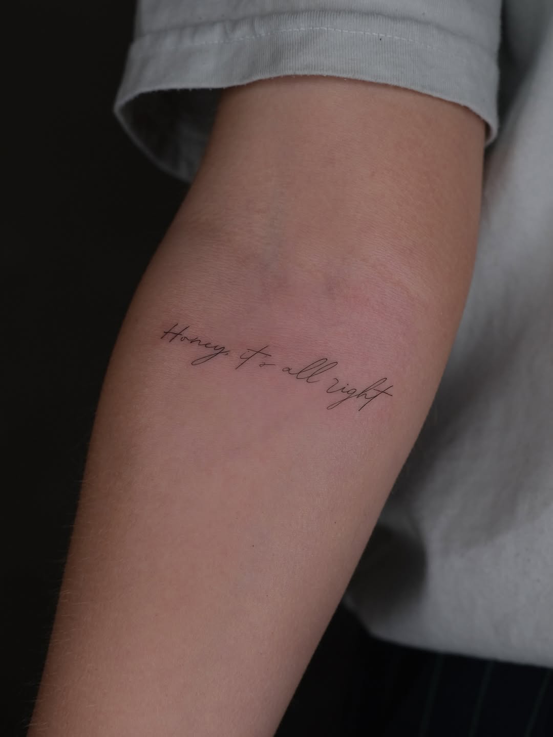 Elegant cursive tattoo with a heartfelt message