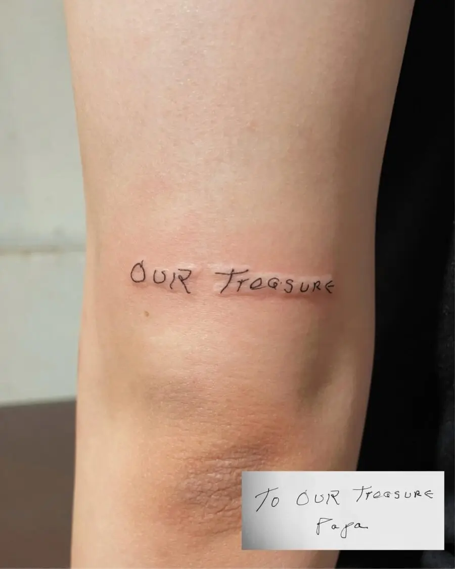 Elegant handwriting tattoo with a personal touch