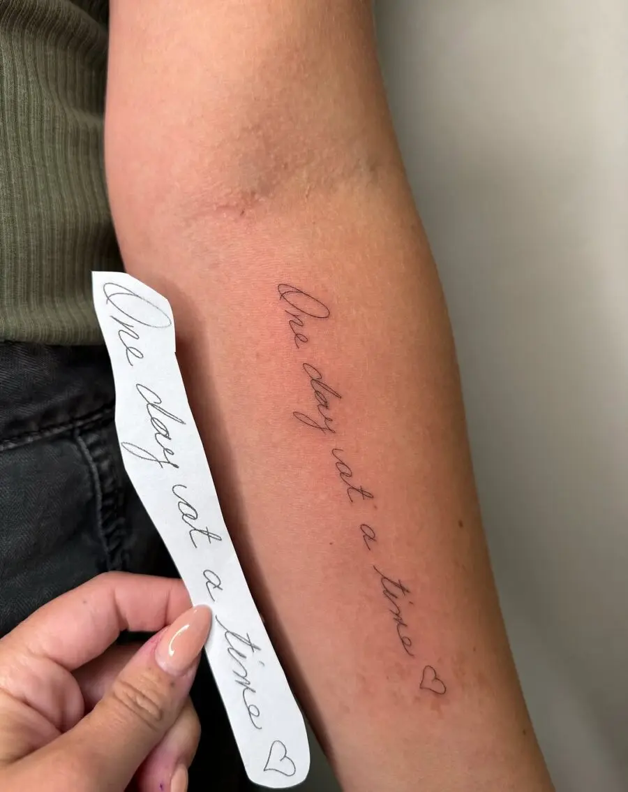 Minimalist Handwriting Tattoo Inspiring Serenity