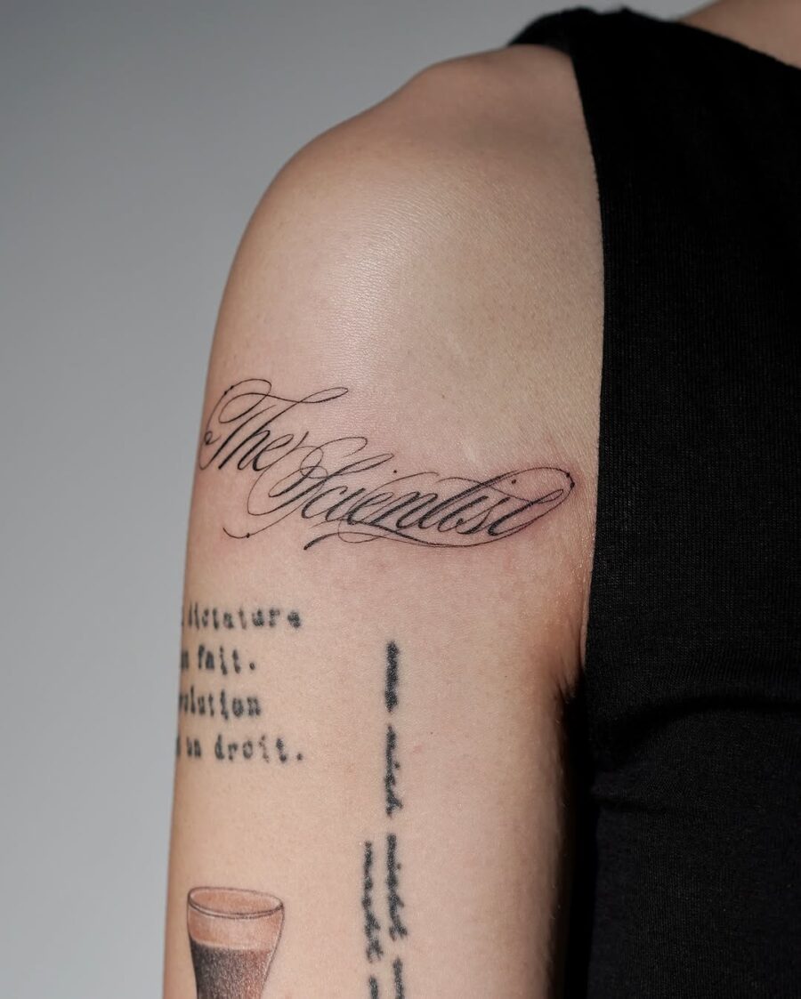 Elegant handwriting tattoo with personal meaning