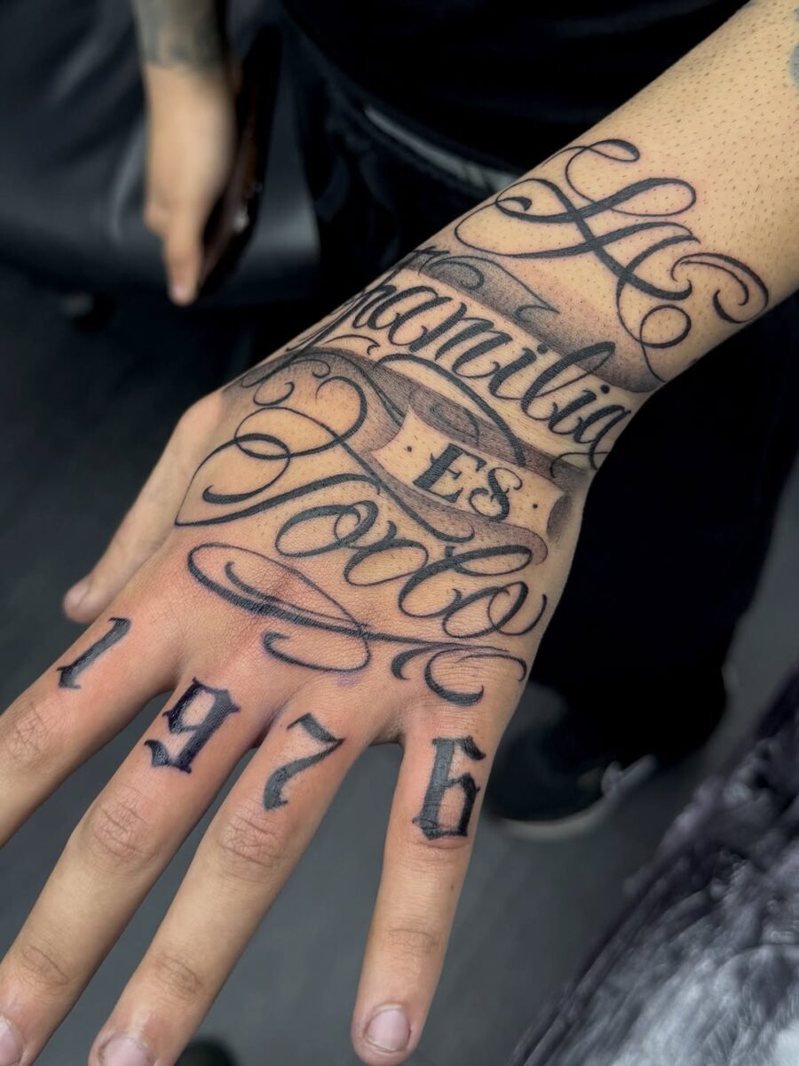 Elegant script tattoo with personal meaning