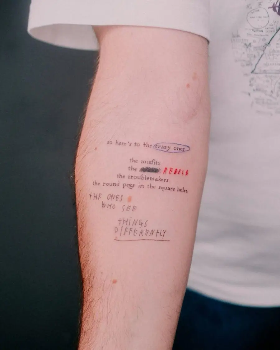 Inspirational handwritten quote tattoo on arm