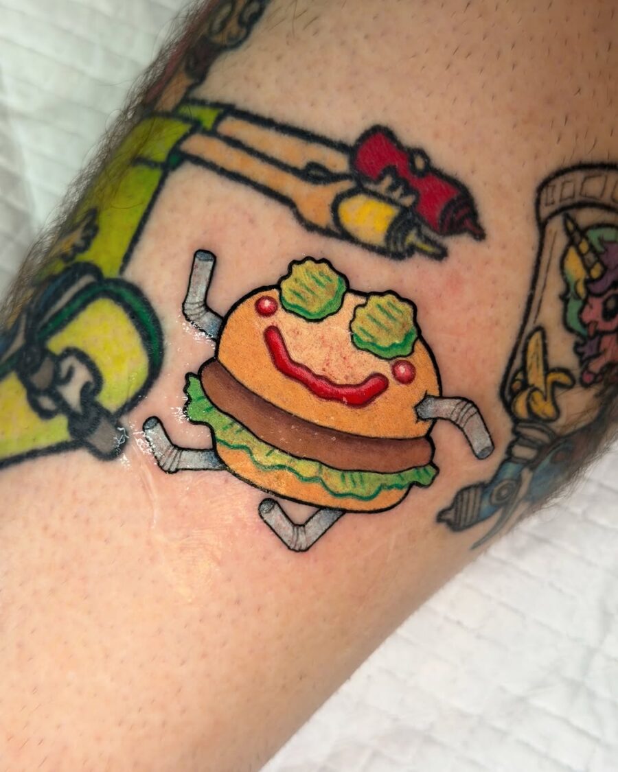 Playful burger tattoo with a cheerful vibe