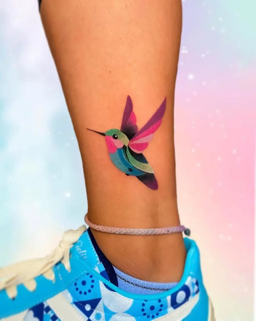 Vibrant hummingbird tattoo in bright colors