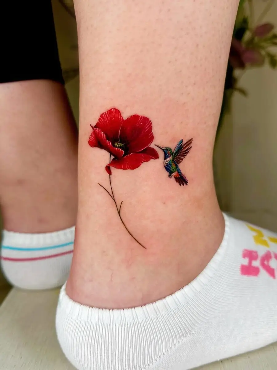 Vibrant hummingbird alongside a gorgeous flower