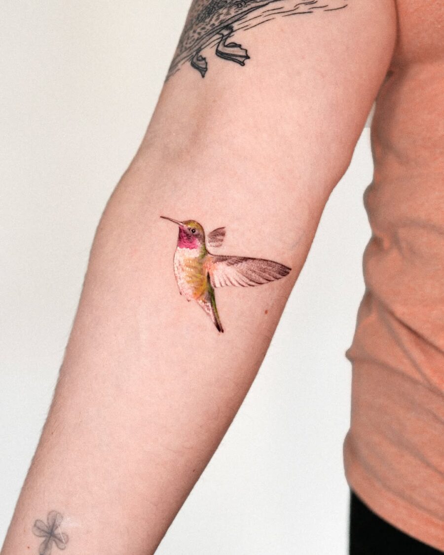 Vibrant hummingbird tattoo showcasing intricate details