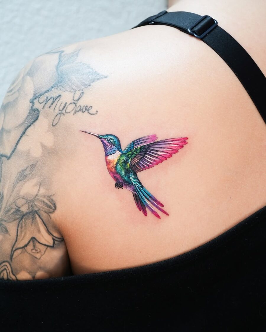 Stunning color blend in vibrant hummingbird tattoo