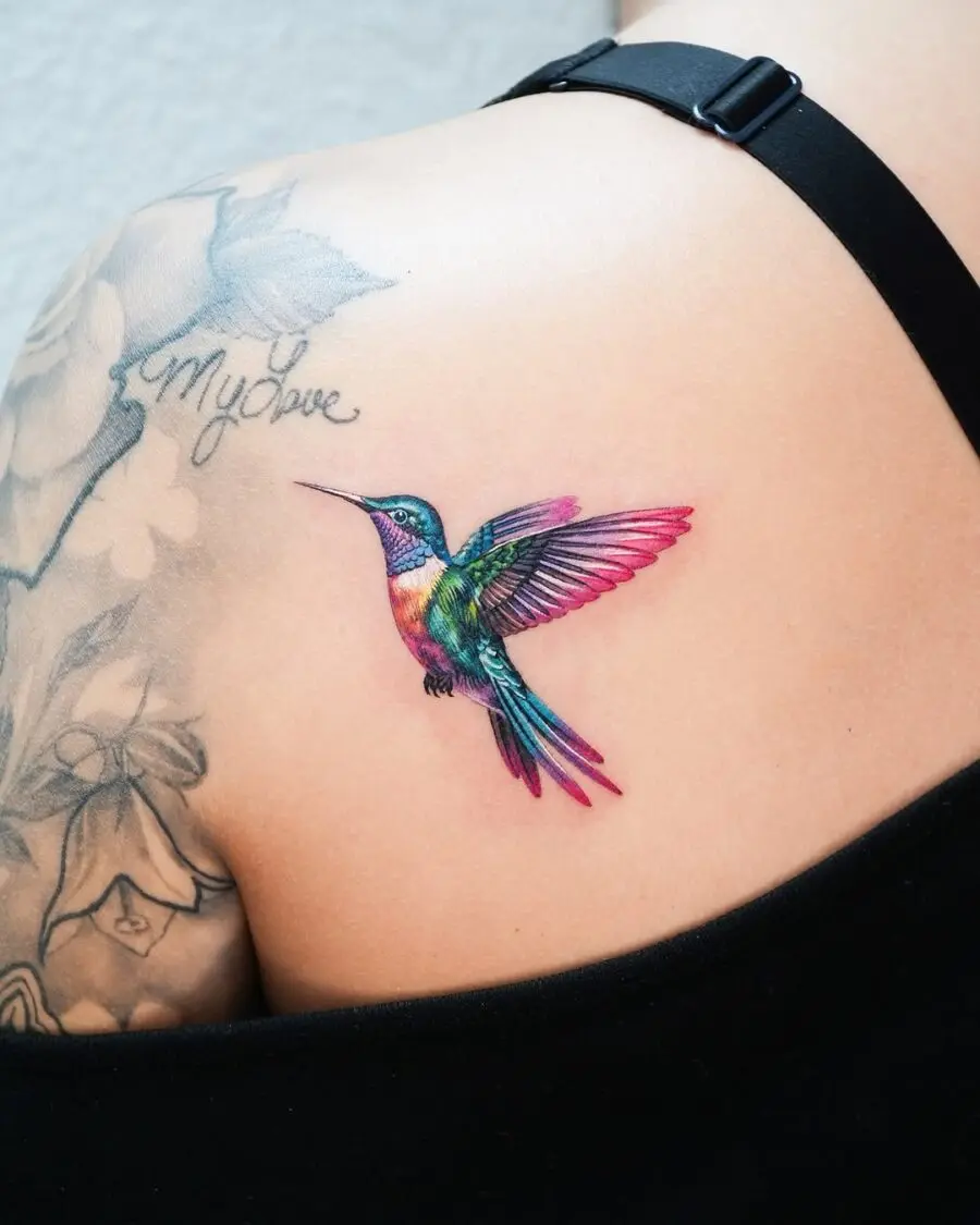 Stunning color blend in vibrant hummingbird tattoo