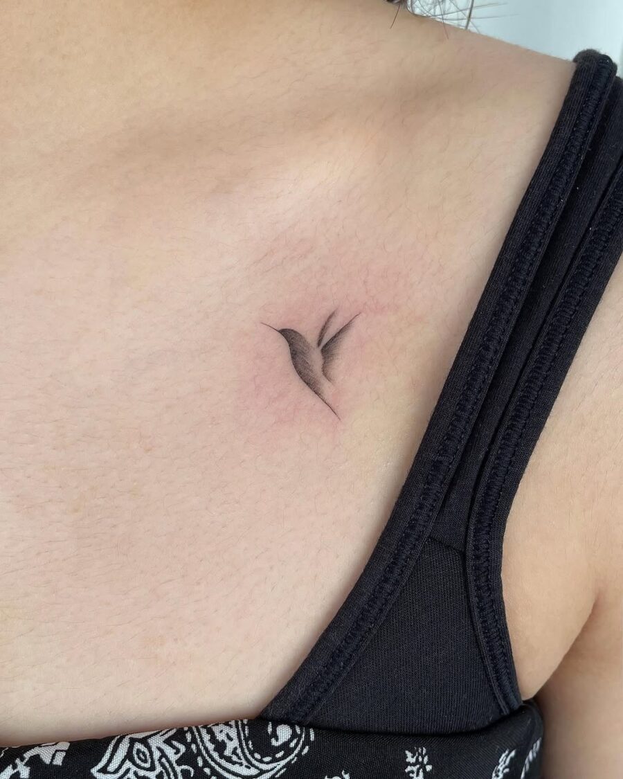 A graceful hummingbird in delicate black ink