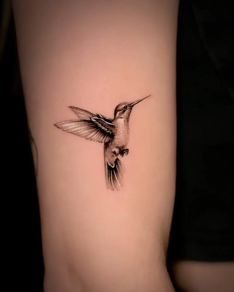 Elegant hummingbird tattoo showcasing intricate details
