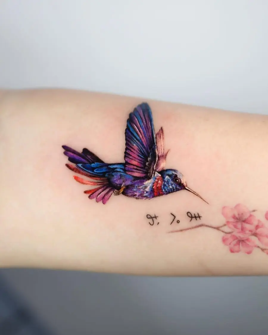 Vibrant hummingbird soaring with floral accents