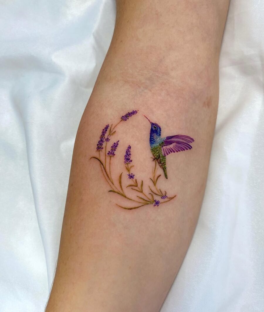 Vibrant hummingbird surrounded by delicate lavender flowers