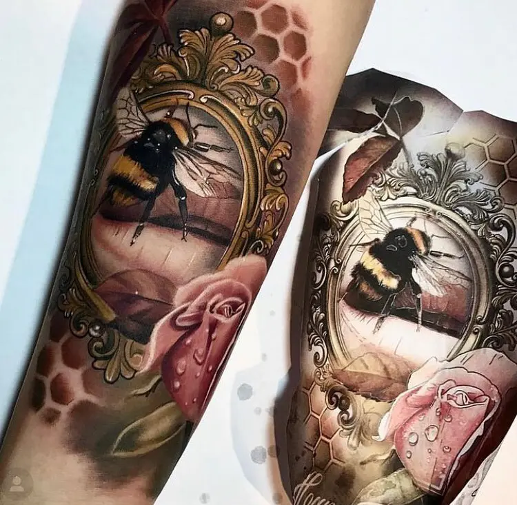 Intricately detailed bee and rose tattoo design