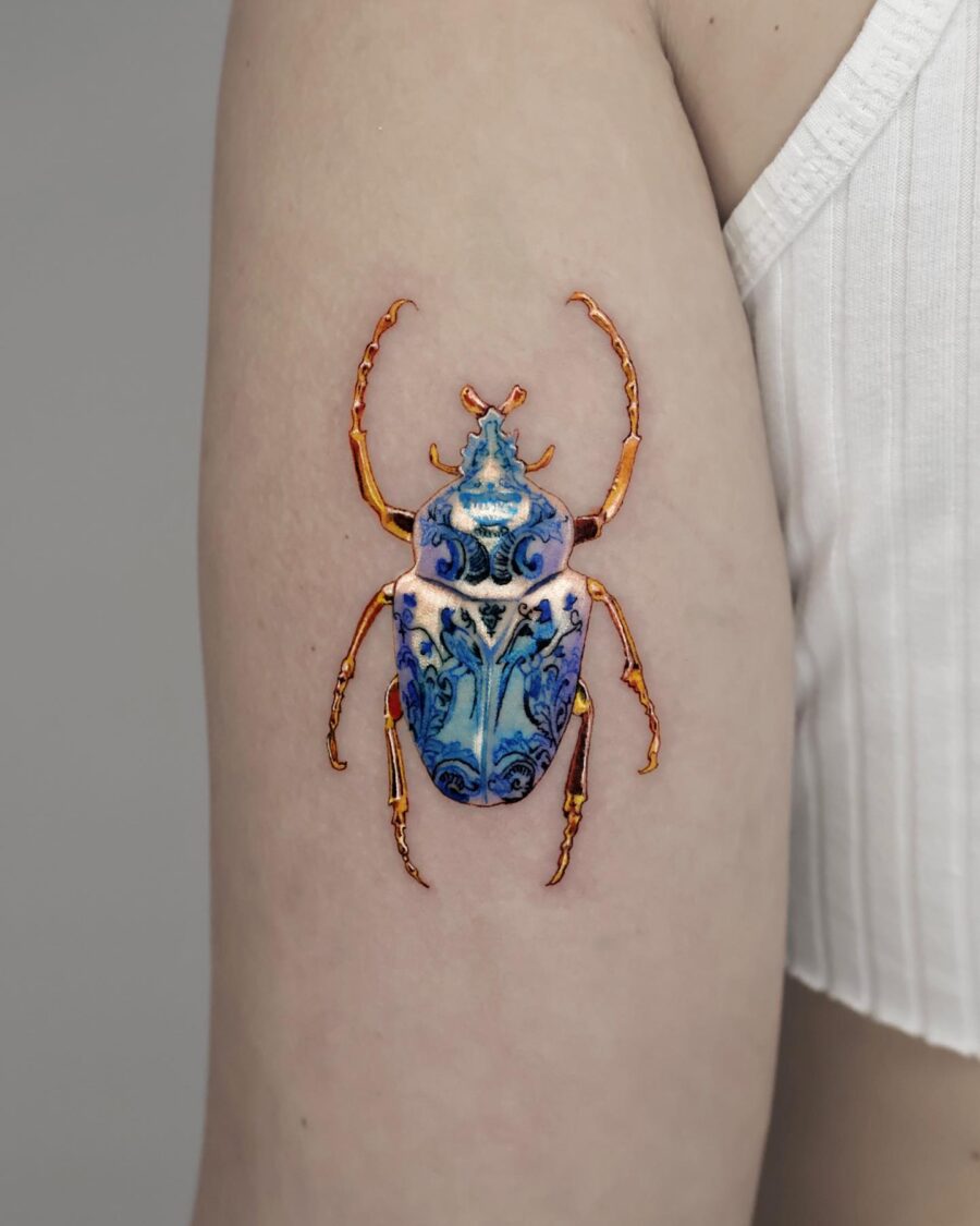 Stunning hyper realistic beetle tattoo design