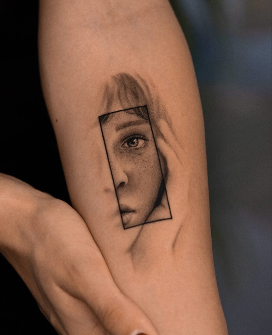 Intricate Tattoo of a Framed Face