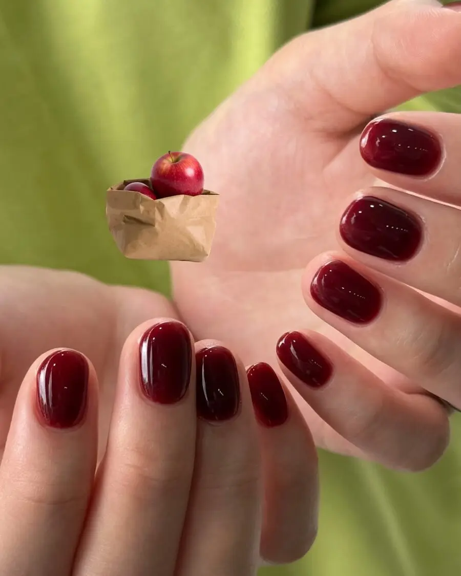 Glossy jelly nails with charming apple accents