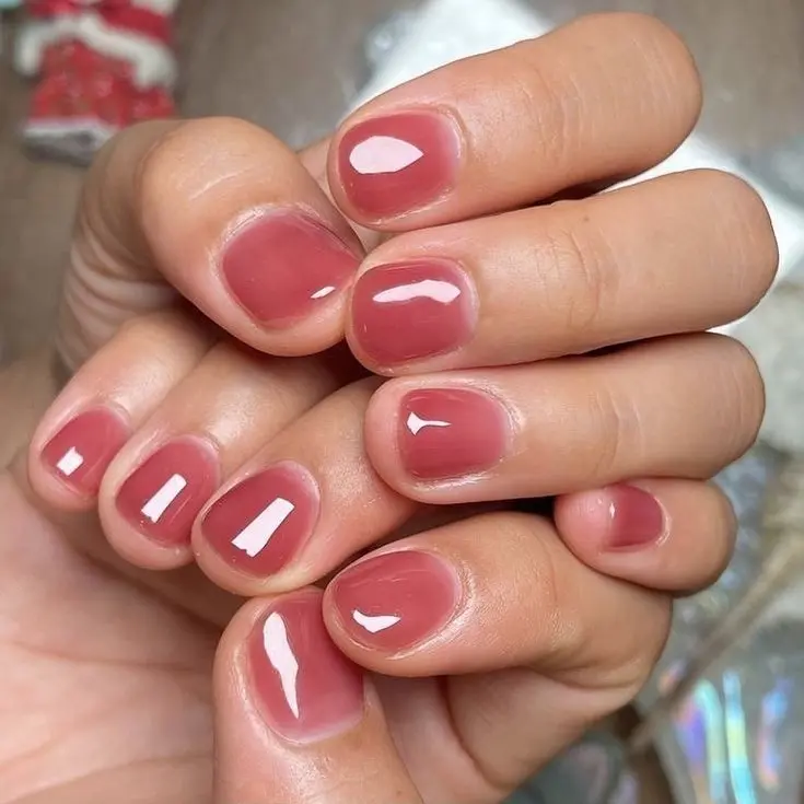 Trendy jelly nails in rosy pink hue