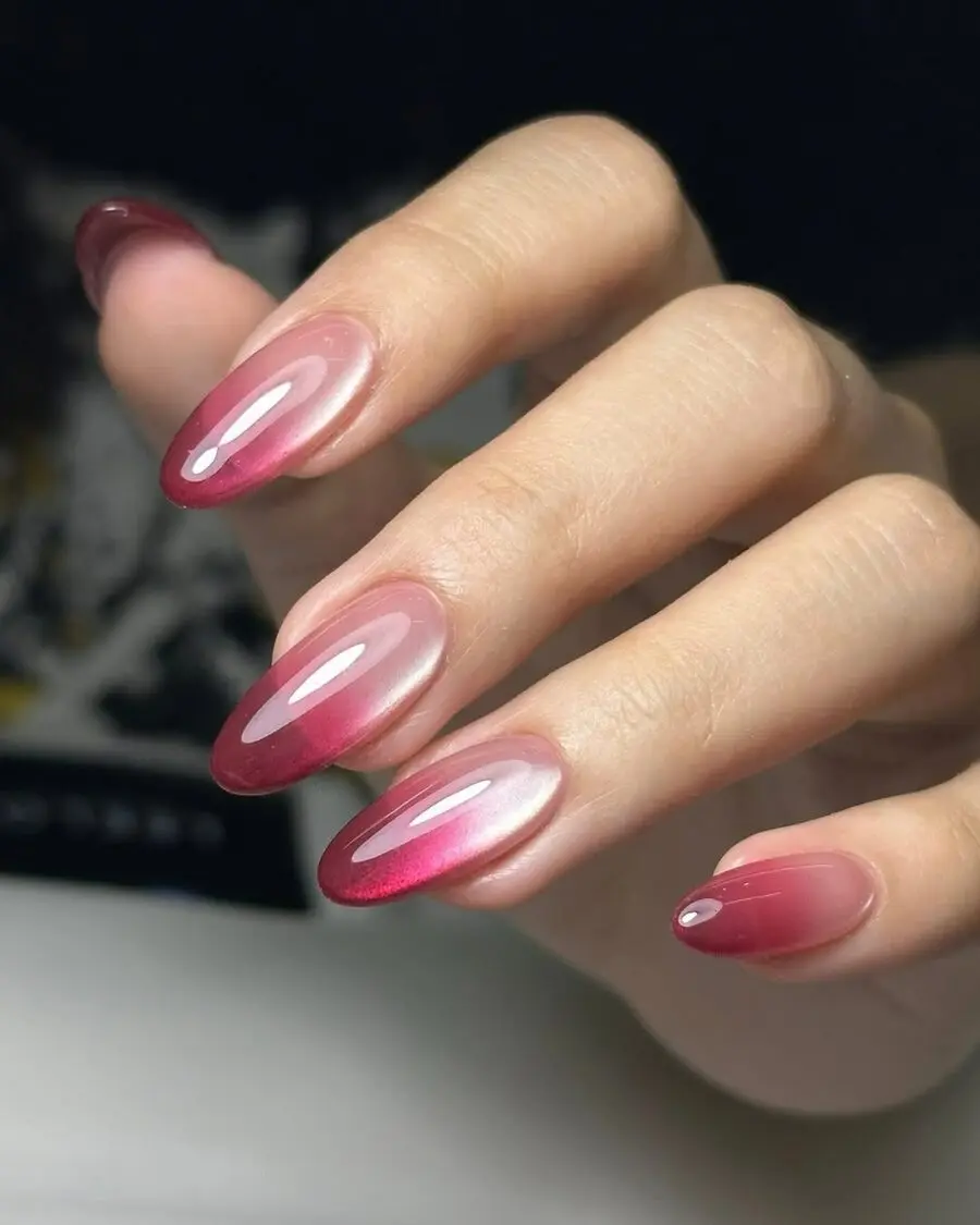 Stylish jelly nails featuring red ombre effect