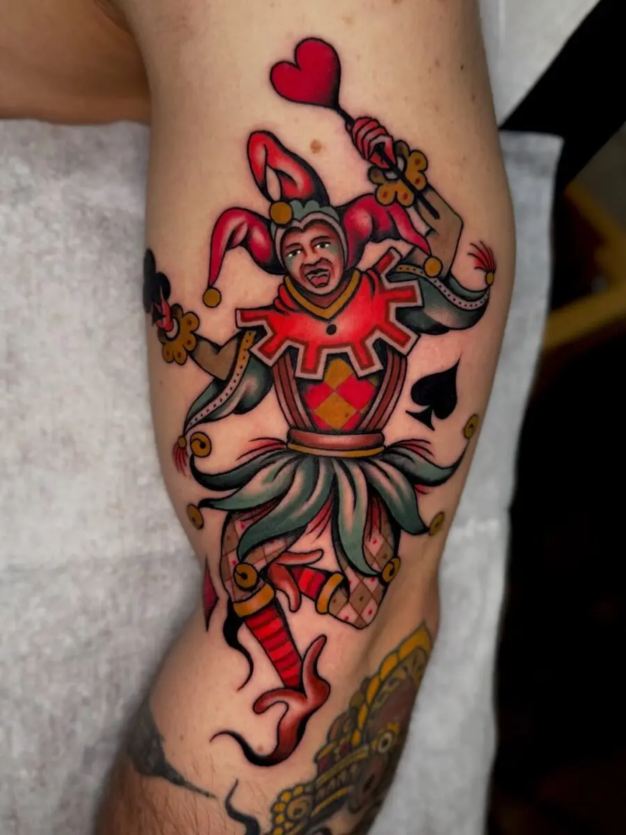 Vibrant Joker Tattoo with Playful Elements