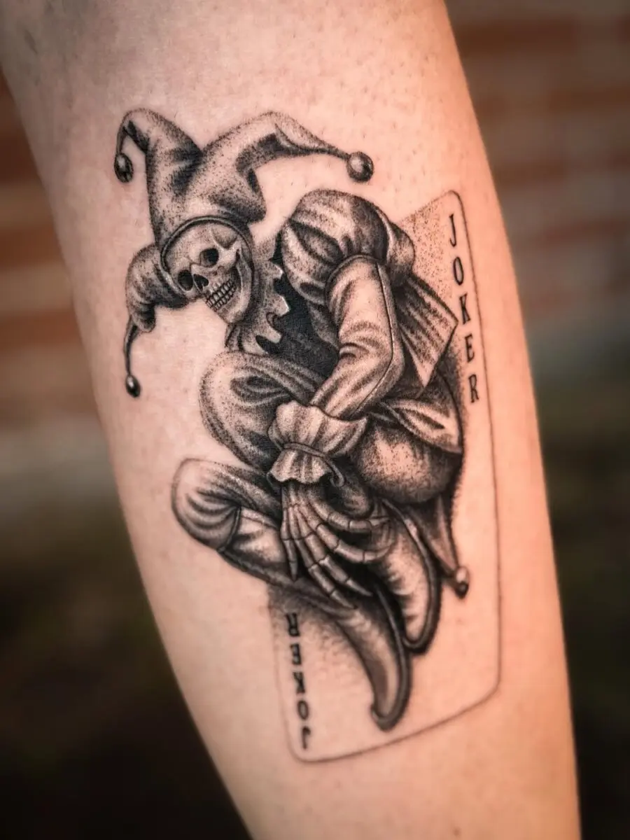 Intricate Joker Tattoo Design with Skull
