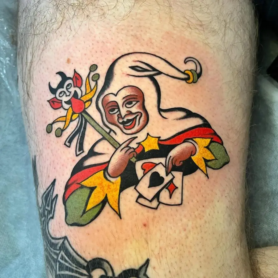 Vibrant Joker Tattoo with Jester Elements