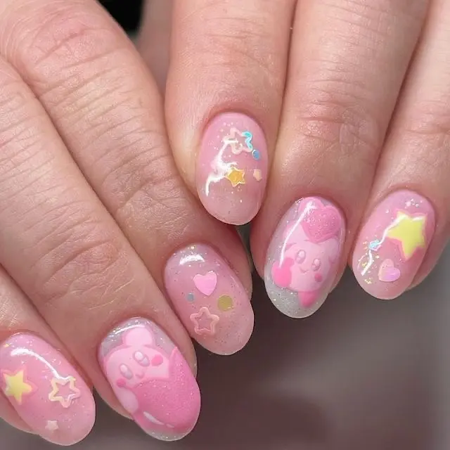 Adorable pink Kirby-inspired nail art design