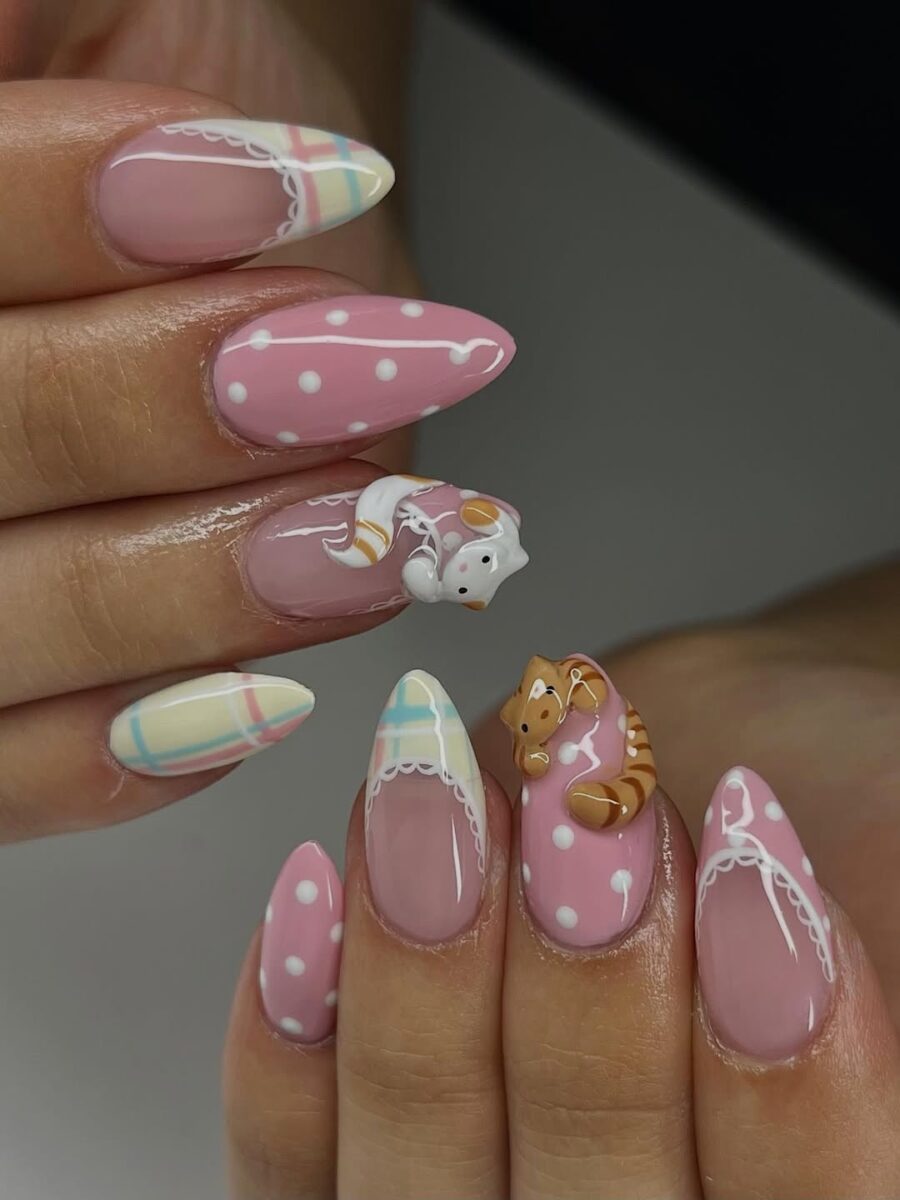 Charming pink nails with cute animal accents