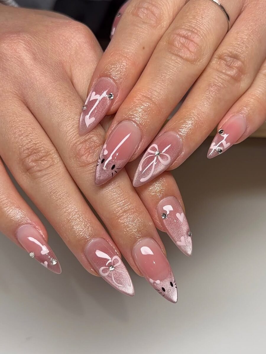 Charming heart and bow nail art design