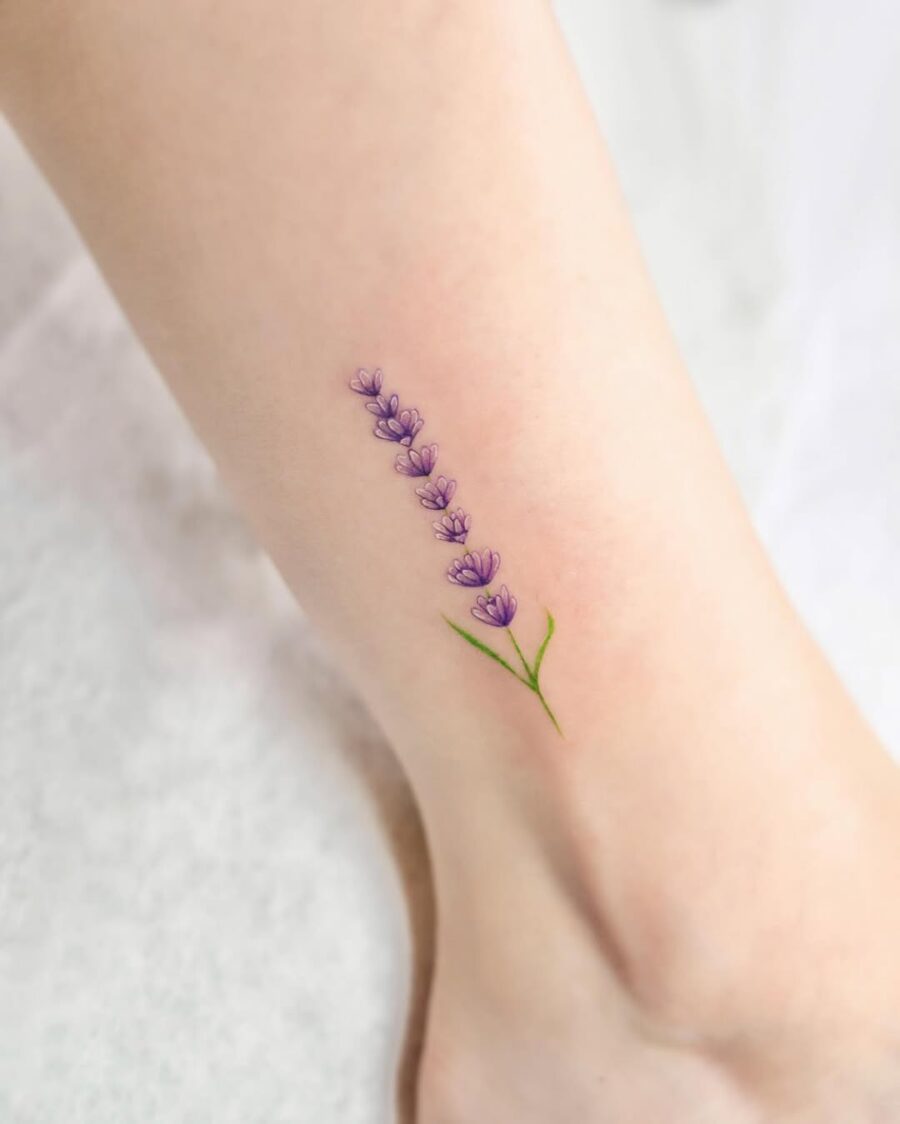 Delicate lavender tattoo accentuating the ankle