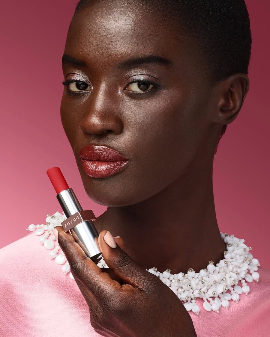 Bold red lipstick for deep skin tones.