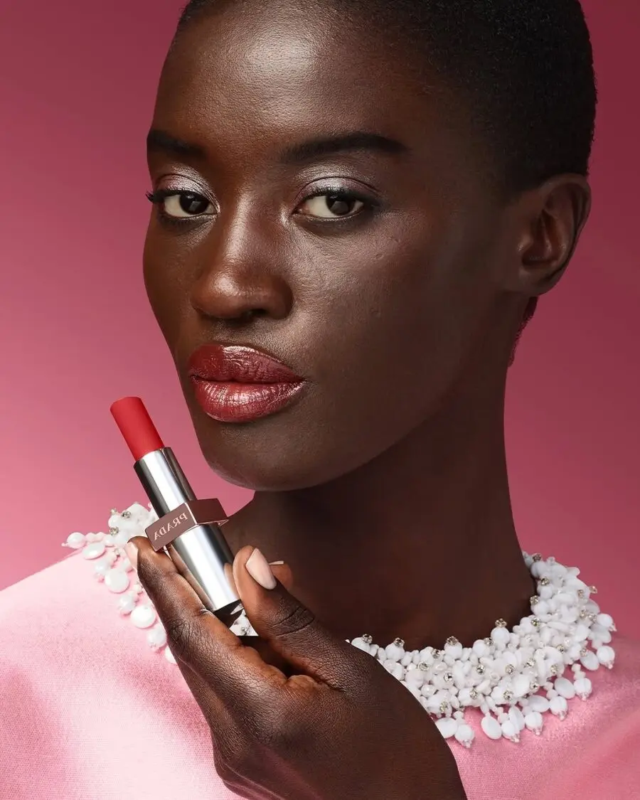 Bold red lipstick for deep skin tones.