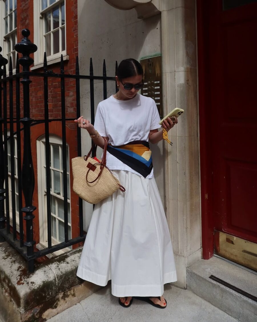 Chic styling with a long white skirt