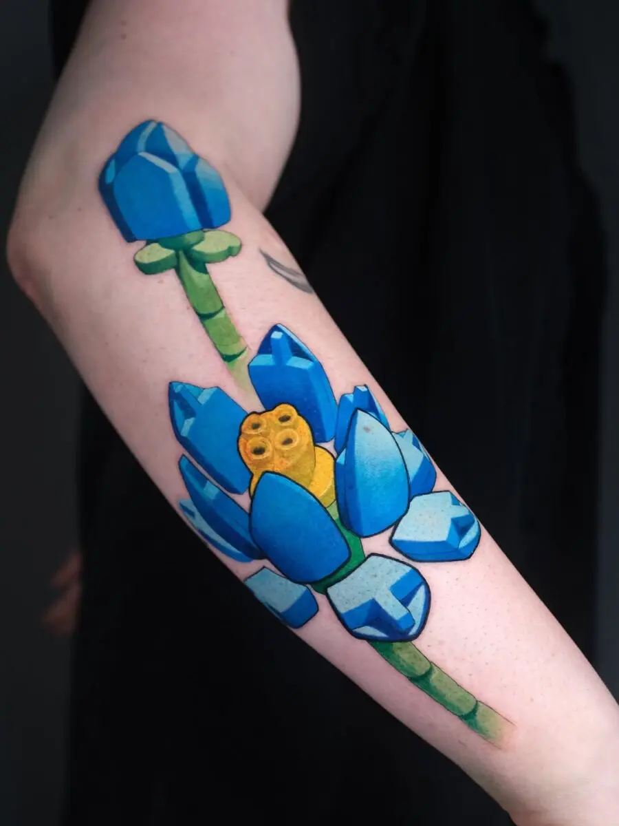 Vibrant lotus flower tattoo with playful elements