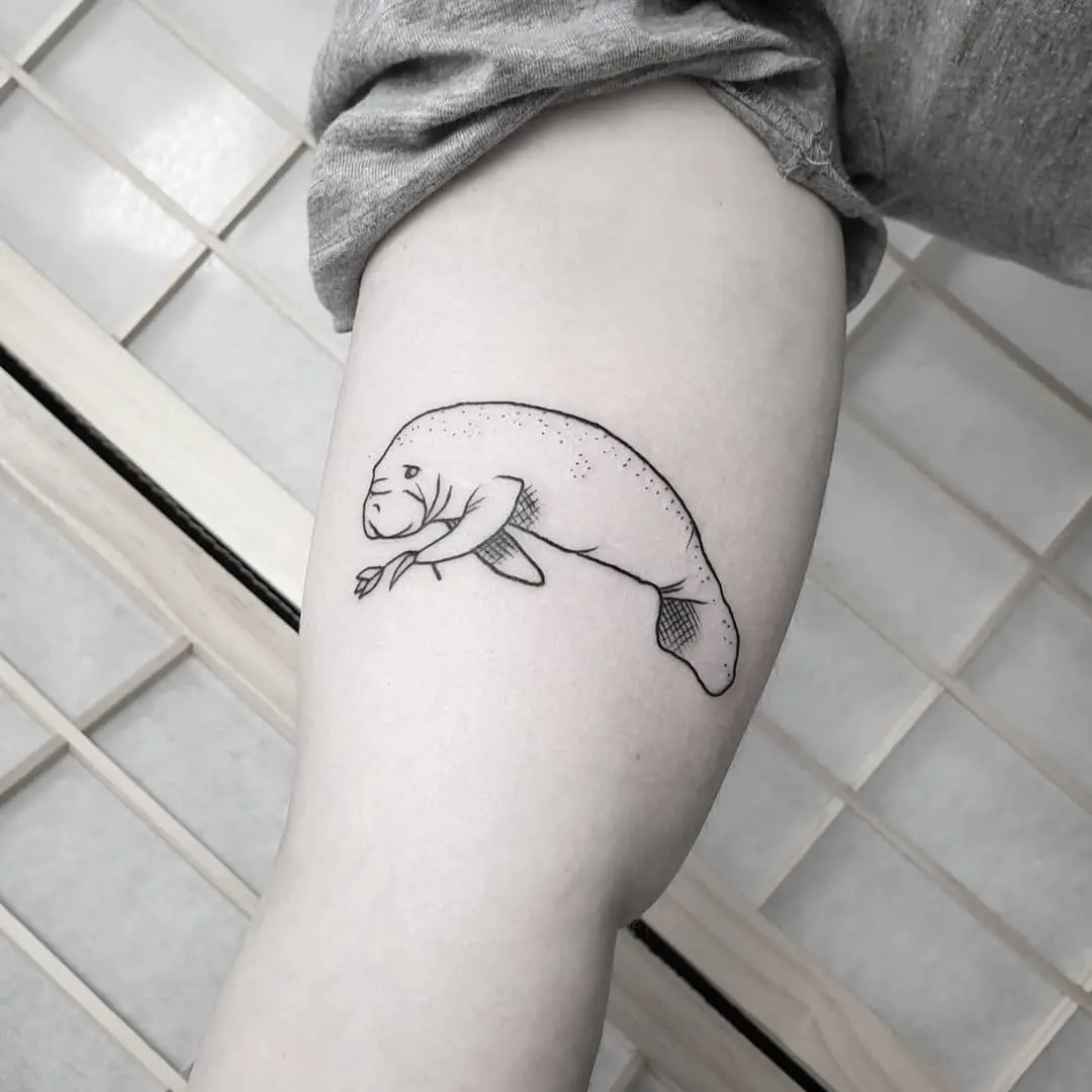 Charming Manatee Tattoo on Thigh