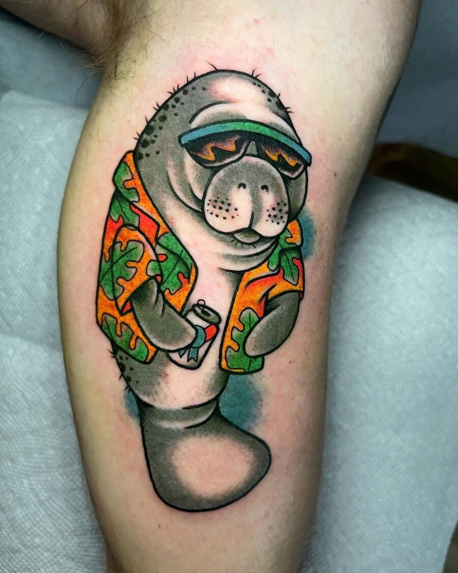 Playful manatee tattoo in summer attire