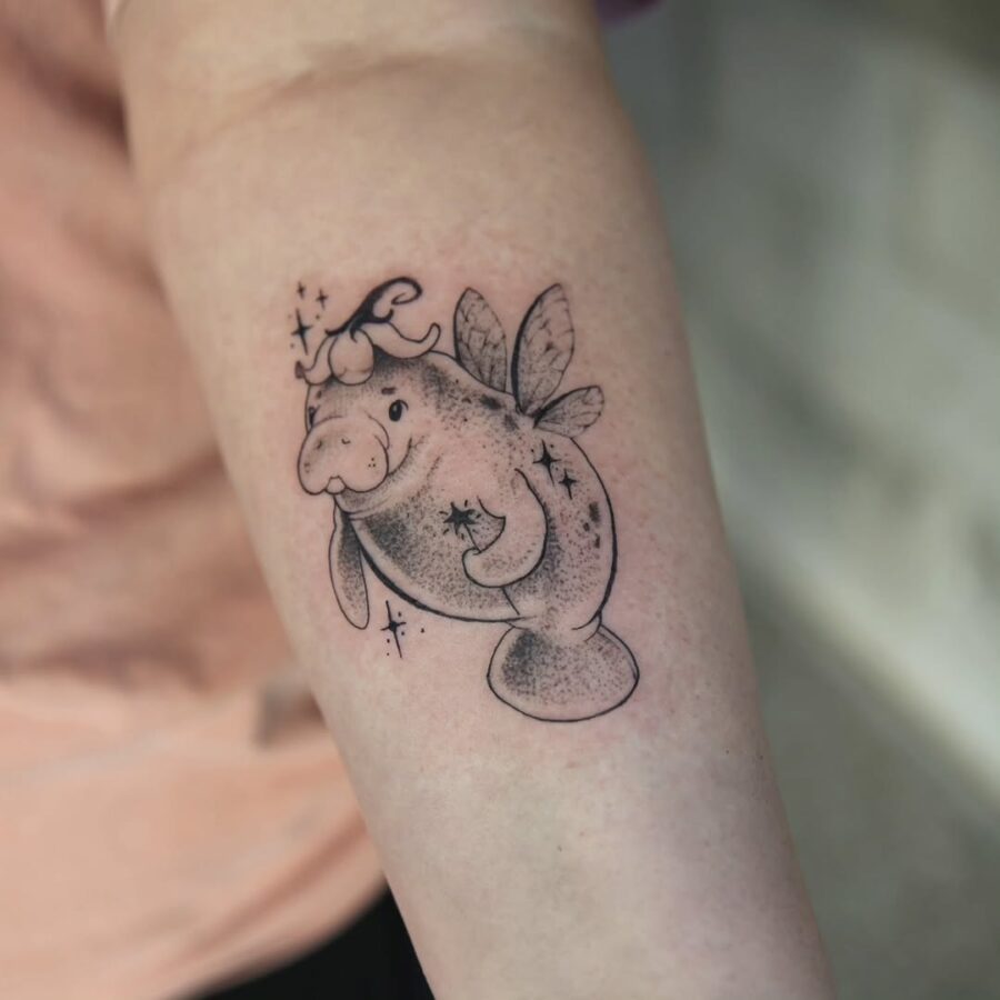 Charming Manatee Fairy Tattoo Design