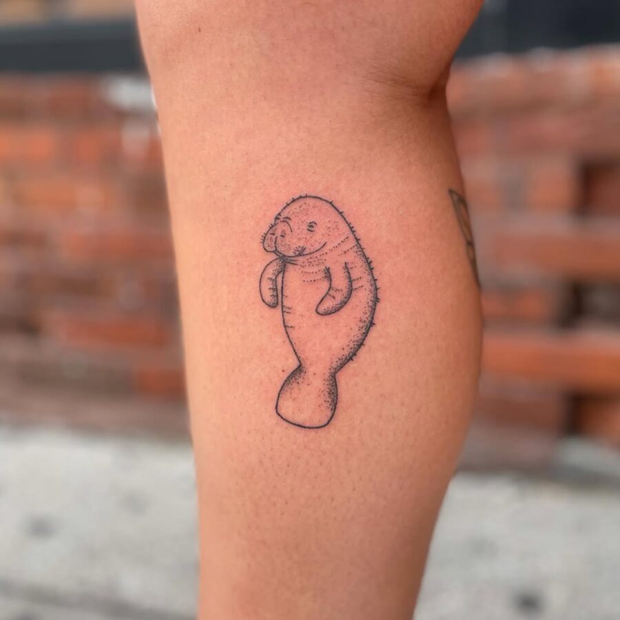 Charming Manatee Tattoo in Minimalist Style