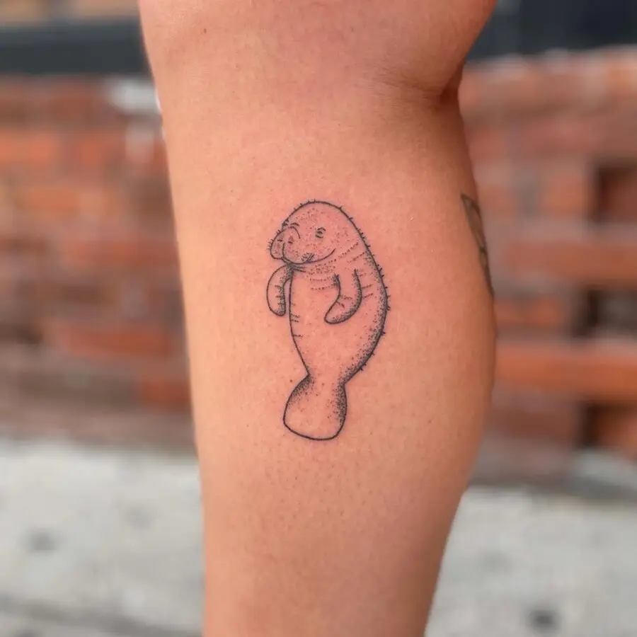 Charming Manatee Tattoo in Minimalist Style