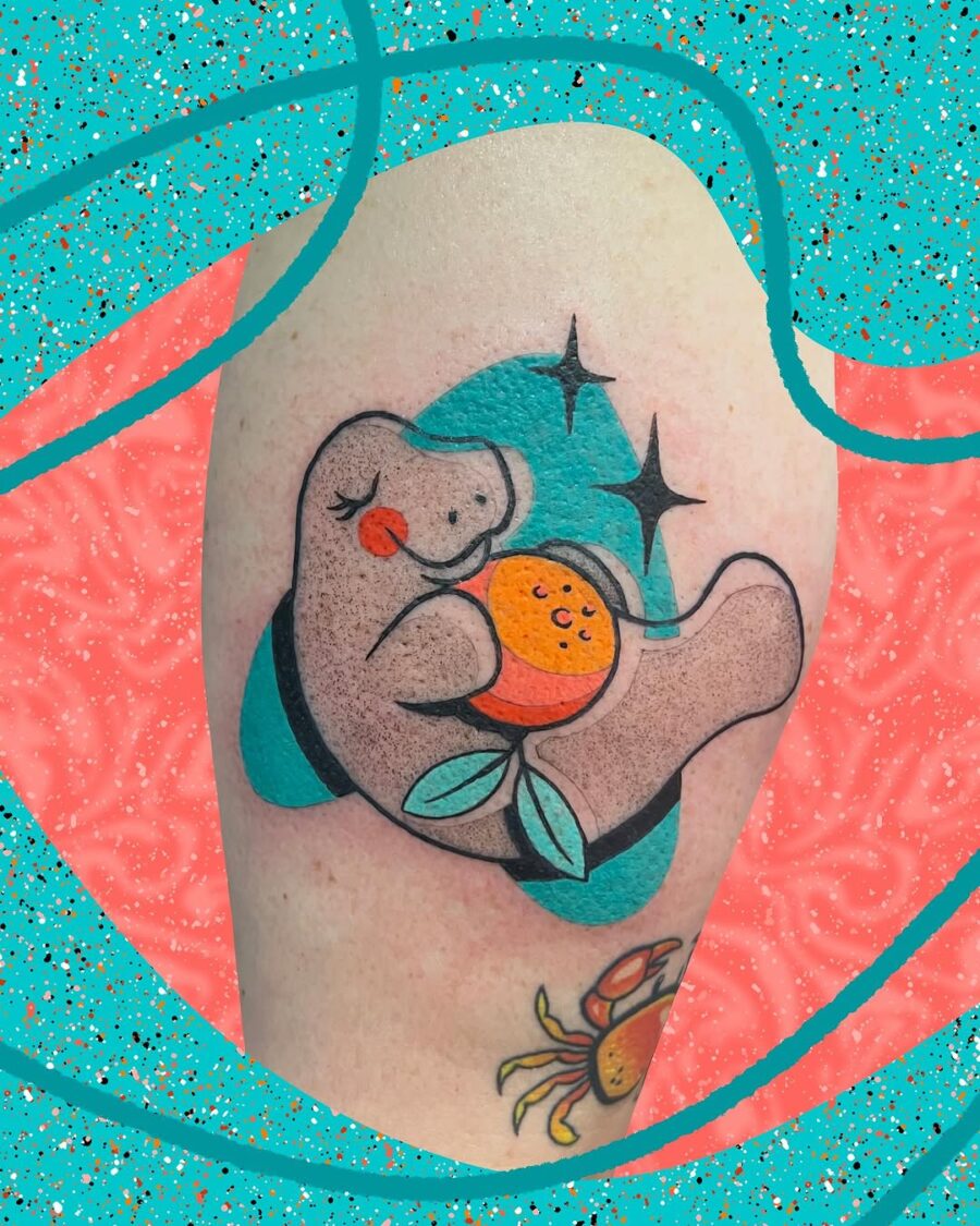 Cute manatee with orange and stars embellishments