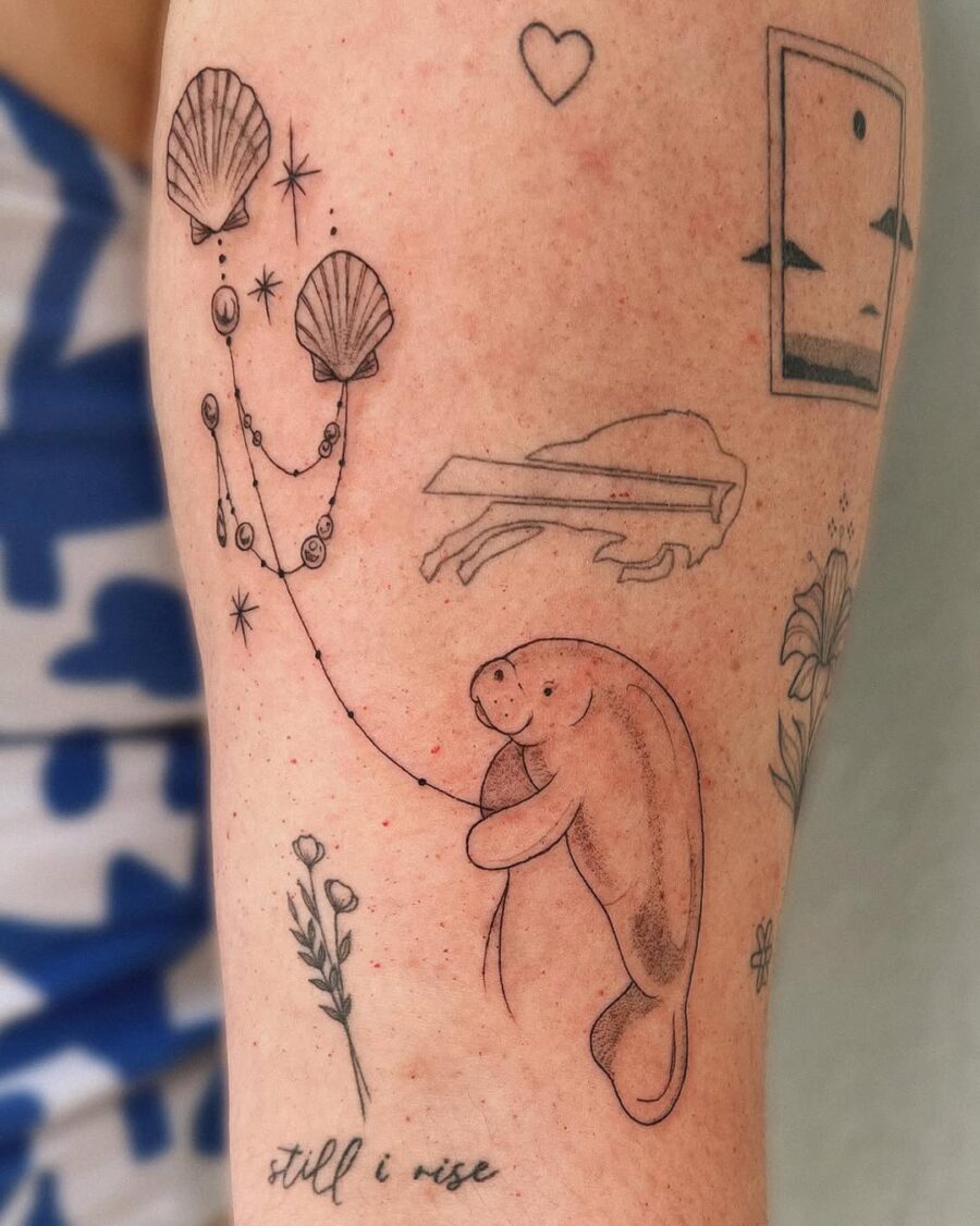 Charming Manatee Tattoo with Nature Elements