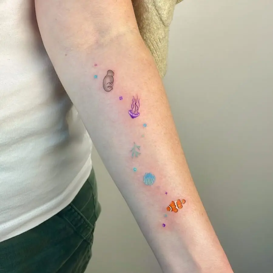 Colorful manatee tattoos with sea life elements