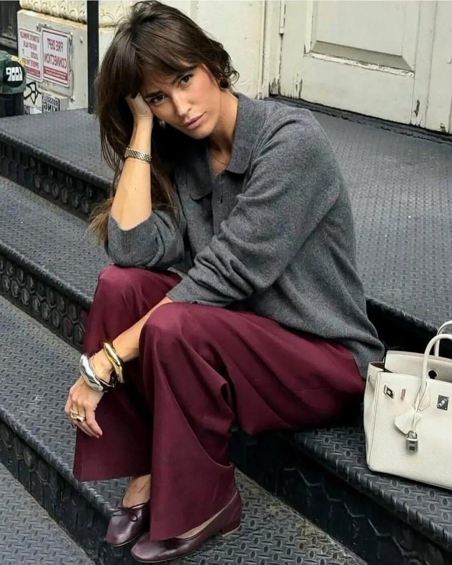 Chic maroon pants with a cozy gray sweater