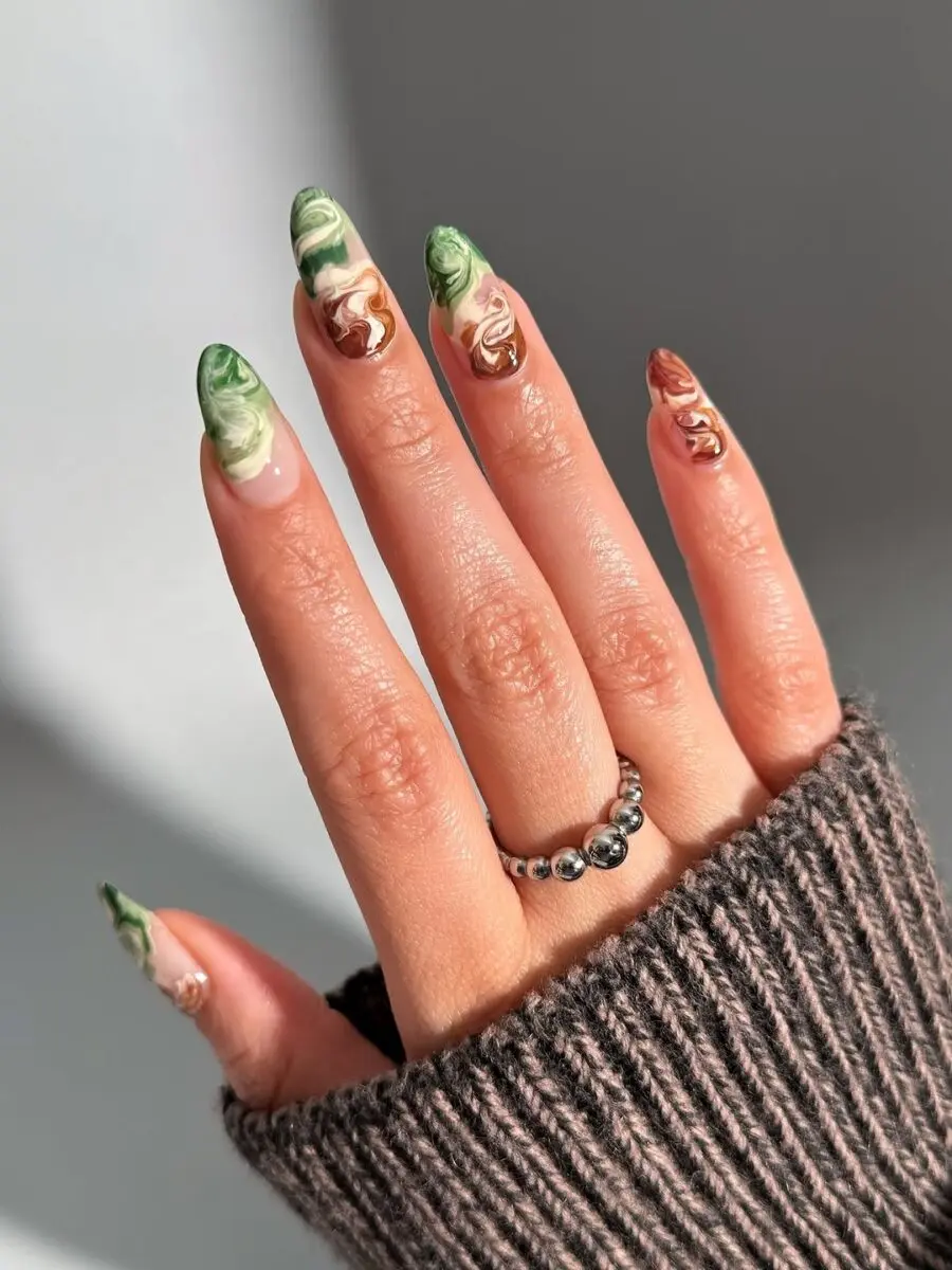 Unique marbled matcha-inspired nail art shines brightly